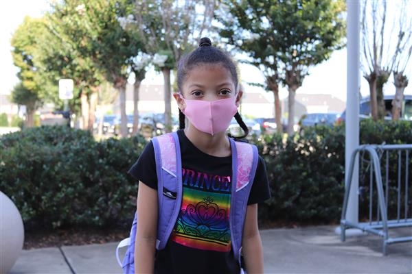student smiles on first day of school